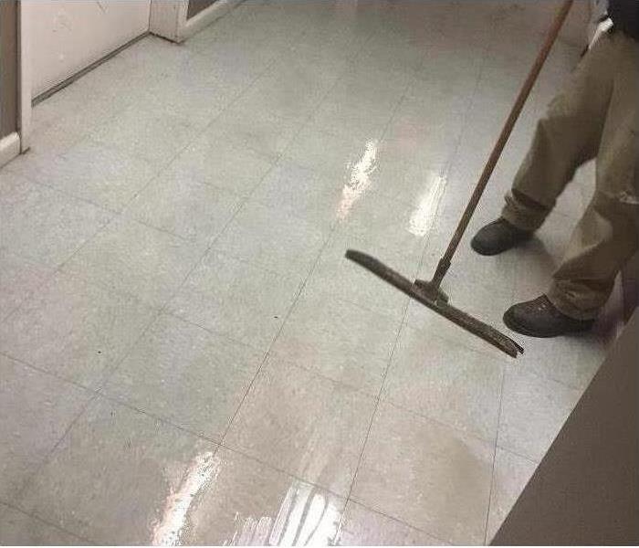 Flooded room in business after